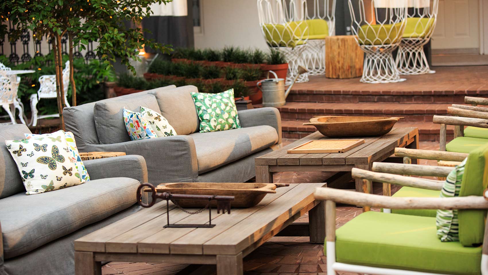 The Kimpton Brice Hotel secret garden seating area