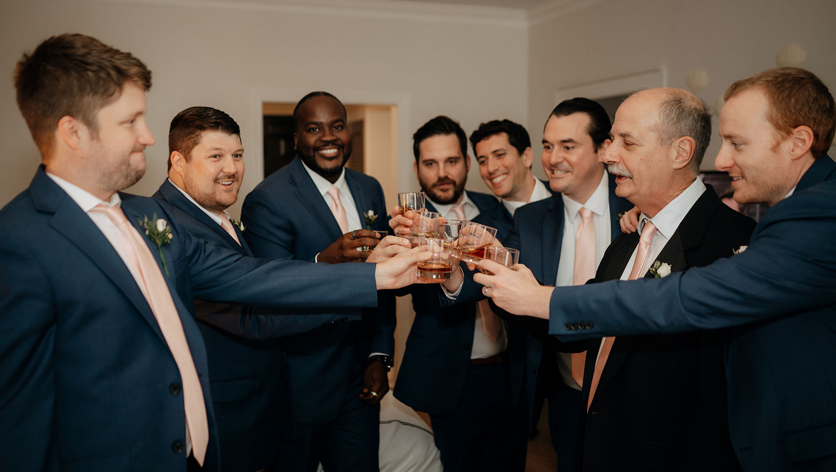 Groom and groomsmen cheers
